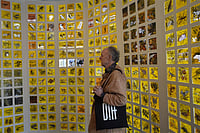 Art Enthusiasts Engage With Powerful Narratives At India Art Fair 2026 | Photo: Vikram Sharma/Outlook : Art enthusiast watch the work of Kulpreet Singh titled Extinction Archive on the agricultural and farming practices in the aftermath of the green revolution