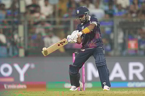 United States' Shubham Ranjane plays a shot during the T20 World Cup cricket match between India and the United States in Mumbai.