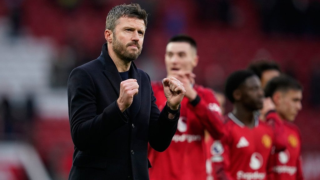 Photo: AP : Manchester United's head coach Michael Carrick celebrates at the end of the English Premier League match between Manchester United and Fulham in Manchester.