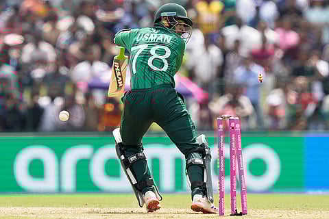 Pakistan's Usman Khan is bowled out by Netherlands' Paul van Meekeren during the T20 World Cup cricket match between Netherlands and Pakistan in Colombo, Sri Lanka.