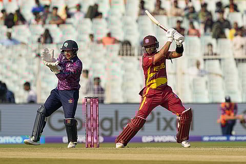 West Indies' captain Shai Hope plays a shot during the T20 World Cup cricket match between Scotland and West Indies in Kolkata.