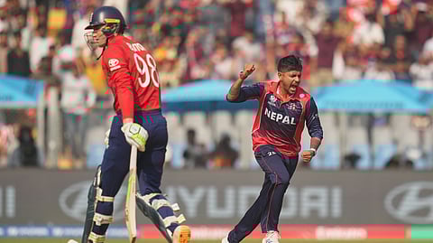 Nepal's Sandeep Lamichhane celebrates the wicket of England's Tom Banton, left during the T20 World Cup cricket match between England and Nepal in Mumbai, India, Sunday,Feb. 8, 2026
