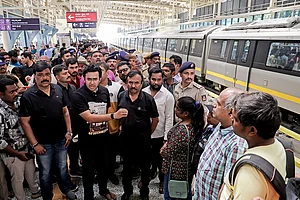 Photo: PTI : BJP MP Tejasvi Surya interacts with commuters at RV Road Metro Station over concerns regarding the proposed Bengaluru Metro fare revision, in Bengaluru, Karnataka.