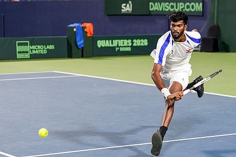 Bengaluru: India's Dhakshineswar Suresh competes against Netherlands' Jesper De Jong, unseen, during the second singles match of the 2026 Davis Cup Qualifiers first round tie, at SM Krishna Tennis Stadium, in Bengaluru, Karnataka.