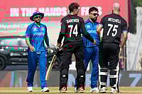 NZ Vs AFG, T20 World Cup 2026: Tim Seifert, Glenn Phillips Power New Zealand To Five-Wicket Win | Photo: AP/Mahesh Kumar A. : Afghanistan's captain Rashid Khan, center, greets New Zealand's Daryl Mitchell, right, and Mitchel Santner after New Zealand won their T20 World Cup cricket match against Afghanistan in Chennai, India.