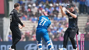 (AP Photo/Mahesh Kumar A.) : Afghanistan's Rahmanullah Gurbaz, center, is bowled out by New Zealand's Lockie Ferguson, left, during the T20 World Cup cricket match between Afghanistan and New Zealand in Chennai, India, Sunday, Feb. 8, 2026.