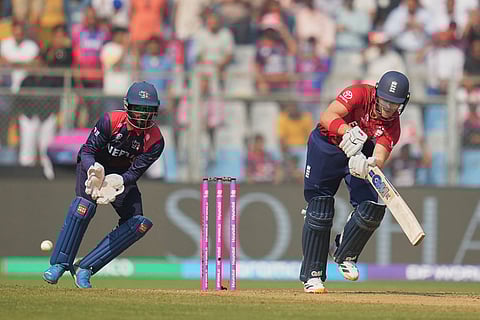 England's Jacob Bethell plays a shot during the T20 World Cup cricket match between England and Nepal in Mumbai, India.