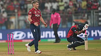 (AP Photo/Rafiq Maqbool) : England's Sam Curran celebrates after wining against Nepal during the T20 World Cup cricket match in Mumbai, India, Sunday,Feb. 8, 2026