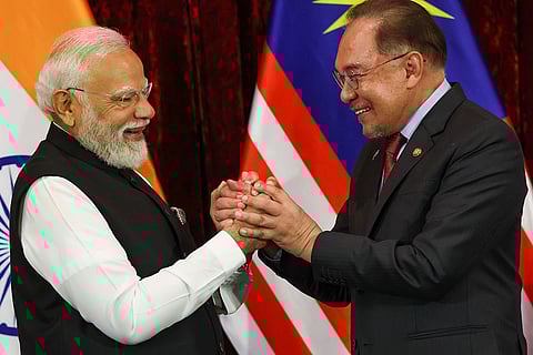 In this image received on Feb. 8, 2026, Prime Minister Narendra Modi with Malaysian Prime Minister Anwar Ibrahim during the exchange of MoUs, in Kuala Lumpur, Malaysia.