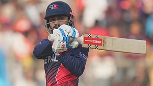 (AP Photo/Rafiq Maqbool) : Nepal's Kushal Bhurtel plays a shot during the T20 World Cup cricket match between England and Nepal in Mumbai, India, Sunday,Feb. 8, 2026