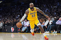 | Photo: AP/Jae C. Hong : Los Angeles Lakers forward LeBron James drives to the basket during the second half of an NBA basketball game against the Golden State Warriors in Los Angeles.
