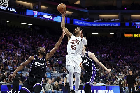 Cleveland Cavaliers guard Donovan Mitchell (45) shoots over Sacramento Kings forward Precious Achiuwa (9) during the second half of an NBA basketball game in Sacramento, Calif.