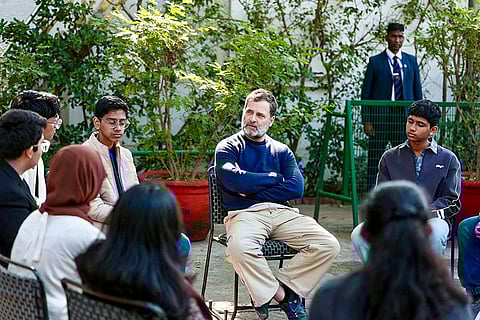 In this image posted on Feb. 8, 2026, Leader of Opposition in the Lok Sabha Rahul Gandhi, centre, interacts with NRI students from the UAE, in New Delhi.