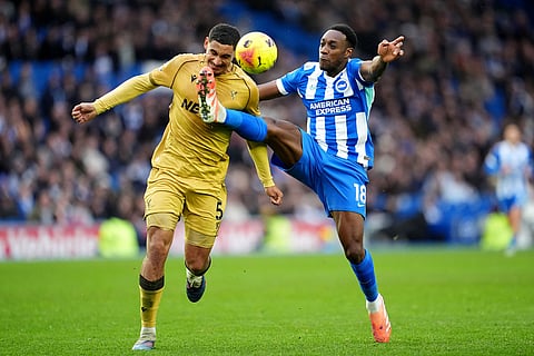 Brighton and Hove Albion's Danny Welbeck, right, and Crystal Palace's Maxence Lacroix in action during their English Premier League soccer match in Brighton, England.