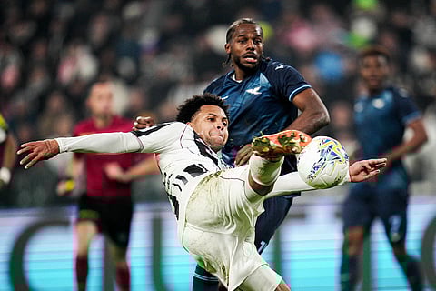 Juventus' Weston McKennie, front, makes an attempt to score during the Serie A soccer match between Juventus and Lazio, in Turin, Italy.