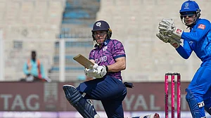 (AP Photo/Bikas Das) : Scotland's captain Richie Berrington plays a shot during the T20 World Cup cricket match between Italy and Scotland in Kolkata, India, Monday, Feb. 9, 2026