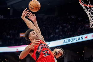 | Photo: Frank Gunn/The Canadian Press via AP : Toronto Raptors forward Trayce Jackson-Davis (32) is fouled by Indiana Pacers guard Ben Sheppard, right, as he goes in for a dunk during second-half NBA basketball game action in Toronto.