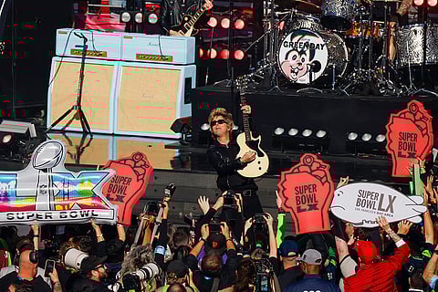 Green Day performs during the pregame at Super Bowl LX between the Seattle Seahawks and New England Patriots in Santa Clara, California.