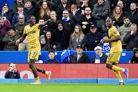 Crystal Palace's Ismaila Sarr, left, celebrates scoring their side's first goal of the game during their English Premier League soccer match against Brighton & Hove Albion in Brighton, England.