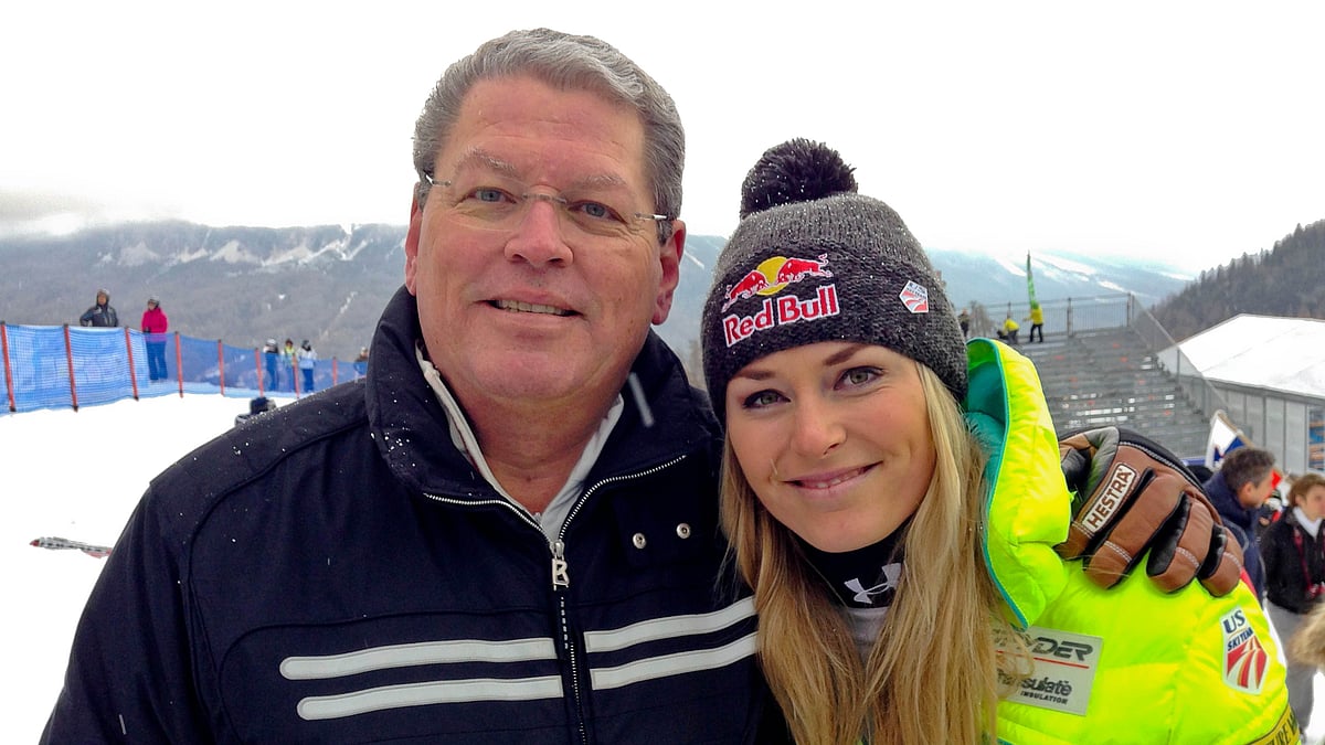United States' Lindsey Vonn, right, poses for photographs with her father Alan Kildow at the end of an alpine ski, women's World Cup downhill race, in Cortina d'Ampezzo, Italy, Friday, Jan. 16, 2015.  - (AP Photo/Andrew Dampf, File)