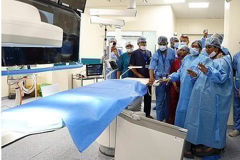 Delhi Chief Minister Rekha Gupta with medics during the inauguration of a CT scan facility, a cath lab, and a neuro ICU at G.B. Pant Hospital, in New Delhi. 