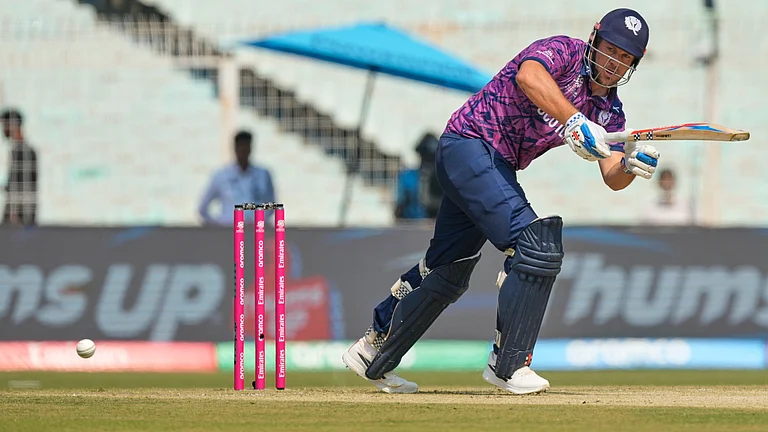 Scotland's George Munsey plays a shot during the T20 World Cup cricket match between Italy and Scotland in Kolkata, India, Monday, Feb. 9, 2026 - (AP Photo/Bikas Das)