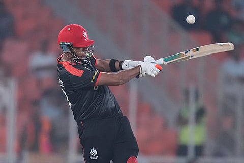 Canada's Harsh Thaker plays a shot during the T20 World Cup cricket match between Canada and South Africa in Ahmedabad.