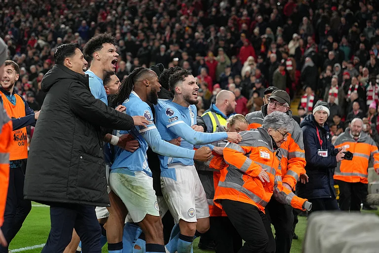 Manchester City players celebrate after the English Premier League soccer match between Liverpool and Manchester City in Liverpool, England. - | Photo: AP/Jon Super