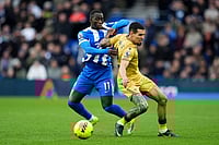 | Photo: Adam Davy/PA via AP : Brighton and Hove Albion's Yankuba Minteh, left, and Crystal Palace's Daniel Munoz in action during their English Premier League soccer match in Brighton, England.