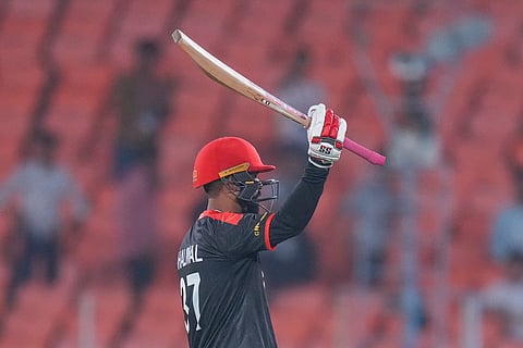 Canada's Navneet Dhaliwal celebrates his fifty runs during the T20 World Cup cricket match between Canada and South Africa in Ahmedabad.