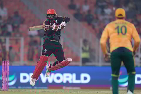 Canada's Navneet Dhaliwal plays a shot during the T20 World Cup cricket match between Canada and South Africa in Ahmedabad.
