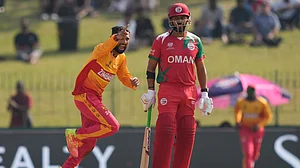 (AP Photo/Eranga Jayawardena) : Zimbabwe's captain Sikandar Raza, left, celebrates the wicket of Oman's Wasim Ali during the T20 World Cup cricket match between Oman and Zimbabwe in Colombo, Sri Lanka, Monday, Feb. 9, 2026