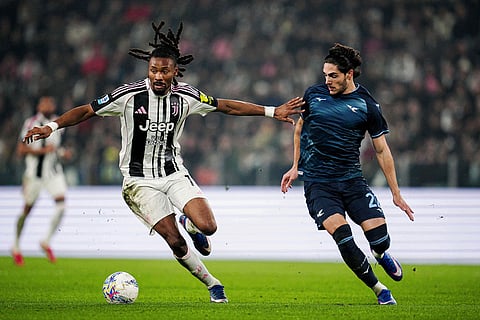Juventus' Khephren Thuram, left, fights for the ball with Lazio's Matteo Cancellieri during the Serie A soccer match between Juventus and Lazio, in Turin, Italy.
