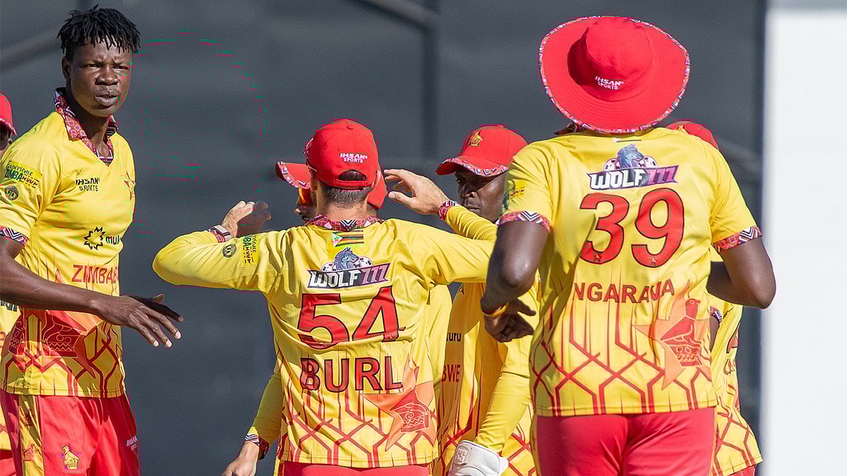 Zimbabwe players celebrate a wicket during the ICC T20 World Cup warm-up match gainst Oman on February 5, 2026. - | Photo: X/ZimCricketv