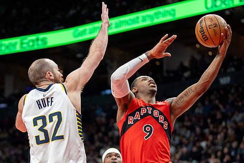 Toronto Raptors forward RJ Barrett (9) goes to the hoop past Indiana Pacers centre Jay Huff (32) during second-half NBA basketball game action in Toronto.