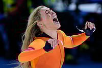 2026 Winter Olympics: Check Best Photos From Day 3 Events At Cortina | Photo: AP/Luca Bruno : Jutta Leerdam of the Netherlands celebrates winning the gold medal in the women's 1,000 meters speedskating race at the 2026 Winter Olympics, in Milan, Italy.