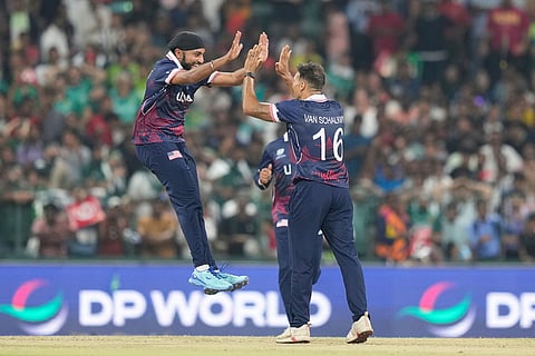 United States' Shadley Van Schalkwyk, right, celebrates with teammates the wicket of Pakistan's captain Salman Agha during the T20 World Cup cricket match between Pakistan and the United States in Colombo, Sri Lanka.