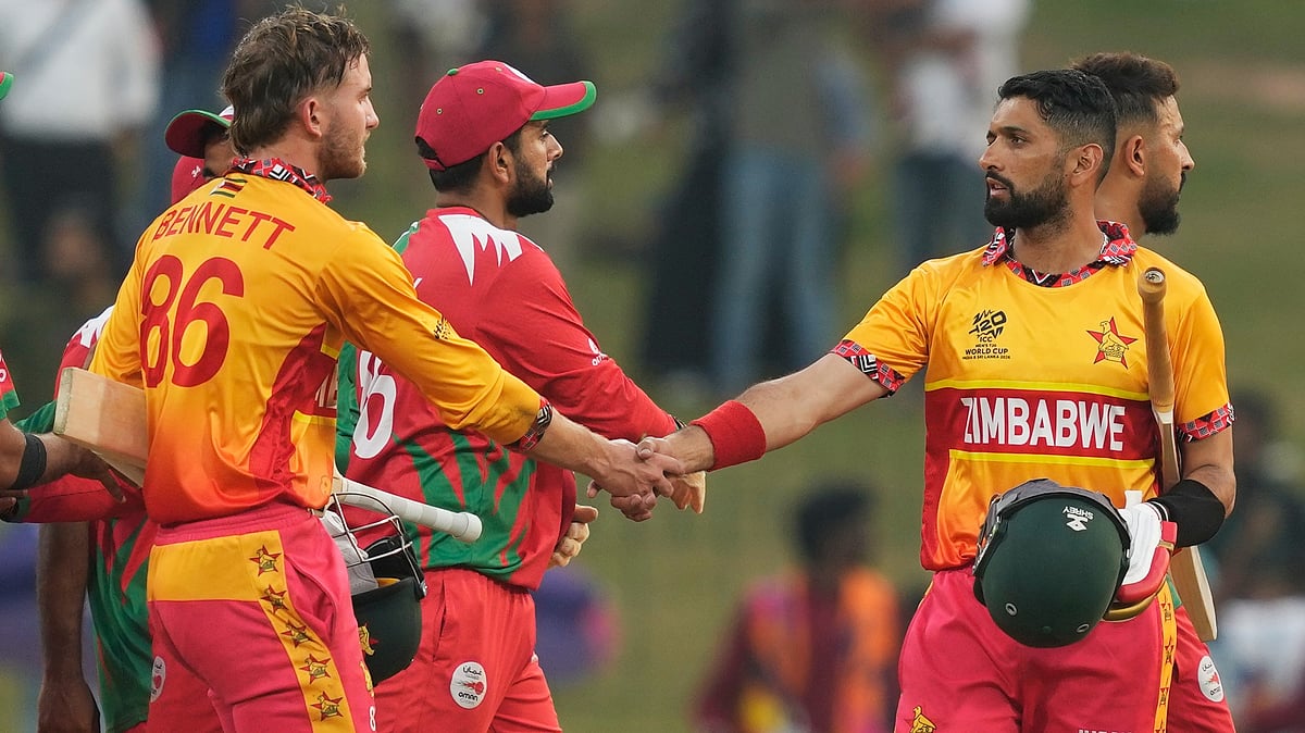 Zimbabwe's captain Sikandar Raza, right, Brian Bennett, left, celebrate after winning their T20 World Cup cricket match against Oman in Colombo, Sri Lanka, Monday, Feb. 9, 2026.  - | Photo: AP/Eranga Jayawardena