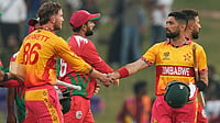 | Photo: AP/Eranga Jayawardena : Zimbabwe's captain Sikandar Raza, right, Brian Bennett, left, celebrate after winning their T20 World Cup cricket match against Oman in Colombo, Sri Lanka, Monday, Feb. 9, 2026. 