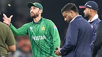 (AP Photo/Eranga Jayawardena) : Pakistan's captain Salman Agha, left, tosses the coin as United States' captain Monank Patel, right, looks on before the start of T20 World Cup cricket match between Pakistan and the United States iin Colombo, Sri Lanka, Tuesday, Feb. 10, 2026