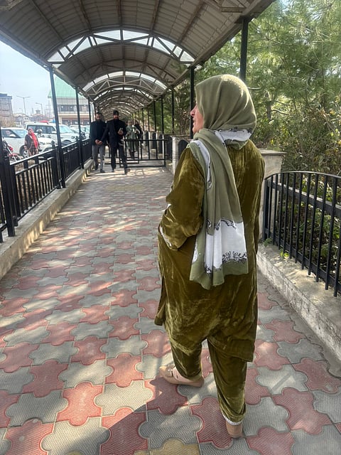 At the district court, she makes her way through the complex. 