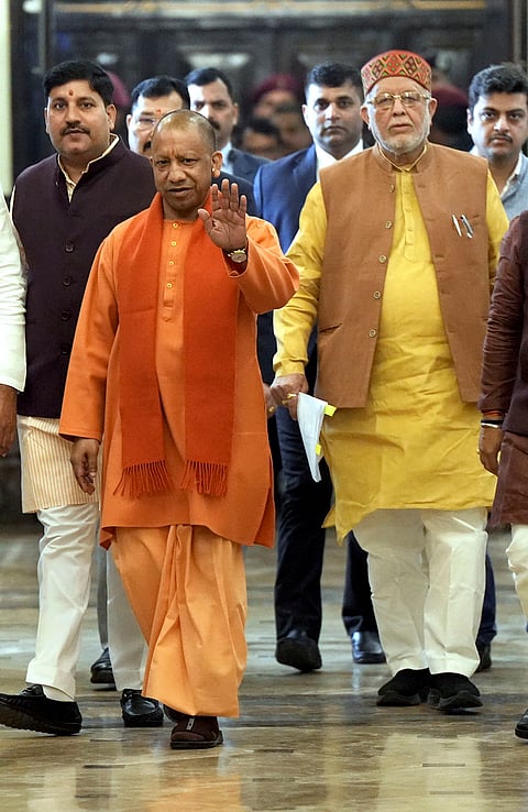 Uttar Pradesh Chief Minister Yogi Adityanath arrives to attend the Budget session of the state Assembly, at Vidhan Bhavan, in Lucknow.