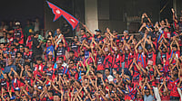 AP : Nepal cricket team's fans cheer for them during Nepal's T20 World Cup match against England in Mumbai.