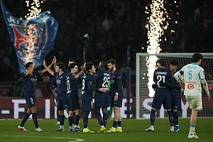 | Photo: AP/Thibault Camus : PSG players celebrate at the end of the French League One soccer match between Paris Saint-Germain and Marseille in Paris, Sunday, Feb. 8, 2026.