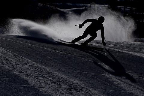 Austria's Daniel Hemetsberger comes into the finish area of an alpine ski men's downhill portion of a team combined race, at the 2026 Winter Olympics, in Bormio, Italy.