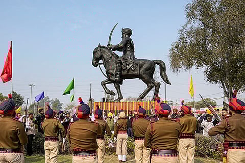 Punjab Cabinet Ministers S Harbhajan Singh ETO, centre, pays tribute to Sikh warrior General Sardar Sham Singh Attariwala on the occasion of 180th Martyrdom Day, on the outskirts of Amritsar, Punjab.