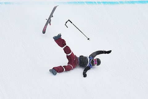 Canada's Megan Oldham crashes during the women's freestyle skiing slopestyle finals at the 2026 Winter Olympics, in Livigno, Italy.
