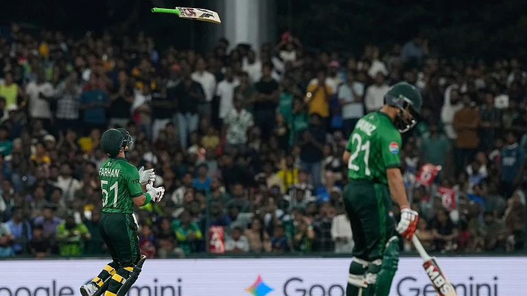 Pakistan's Sahibzada Farhan tosses his bat in the air after losing his wicket during the T20 World Cup cricket match between Pakistan and the United States in Colombo, Sri Lanka, Tuesday, Feb. 10, 2026. - Photo: AP