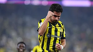 ittihad_en/X : Houssem Aouar celebrating after scoring hat-trick against Al Gharafa in AFC Champions League Elite group B clash.