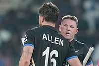 Photo: AP/Mahesh Kumar A. : New Zealand's Tim Seifert, right, and Finn Allen celebrates after won the match against United Arab Emirates during the T20 World Cup cricket match in Chennai, India.